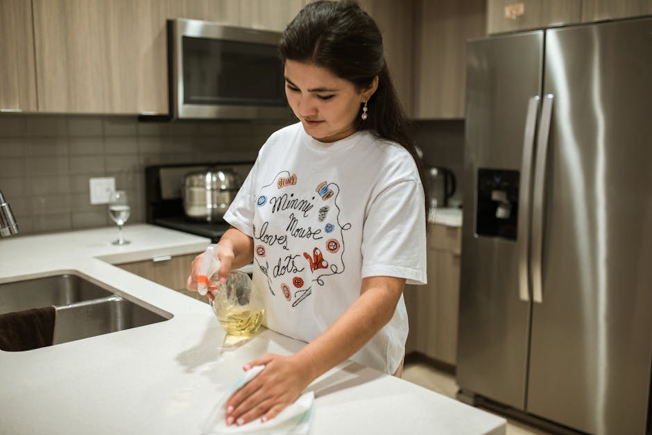 Detail-oriented wiping and sanitization of a kitchen counter